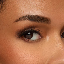 Frisky false lash with natural inner corners transition into flared wispy outer corners shown on an eye
