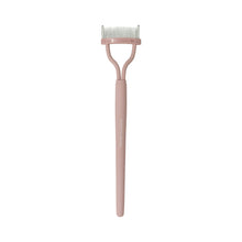 Lash Comb on a white background