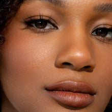 A model wearing Purrr false eyelashes.