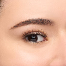 Au Naturale round false lash with natural volume shown on a eye.