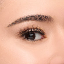 Audrey Mini round false lash with medium volume shown on an eye.