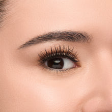 Boudoir Mini round false lashes with full volume and spiky fibers focused at the center shown on an eye.  