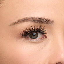 Iconic flared lash with full volume, long length, and defined spiky fibers shown on an eye.