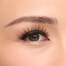 Juliette full-volume, round false lash with extra-long, defined fibers that create a 3D, wet lash look shown on an eye.