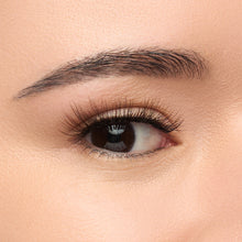 Latte a short, flared lash with natural volume featuring a unique blend of black, brown, and red wine fibers for natural dimension shown on an eye.