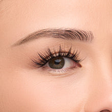 Midnight Luxe a extra-long flared lash with bold volume and textured spiky clusters shown on an eye.