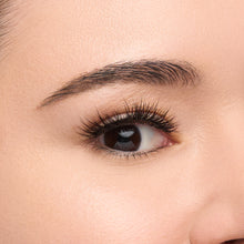 Olivia Mini a short mini round lash with wispy, feathery fibers that mimic a natural lash lift shown on an eye.