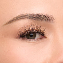 Smokey Muse a long, round lash with full volume and wispy texture shown on an eye.