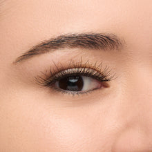 Temptress Wispy a round, wispy lash with medium length and medium volume shown on a eye.