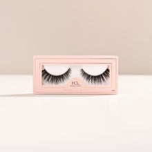 A mini flared lash with full volume and short length, featuring a dense base, tapered ends, and a subtle cat-eye flare. 