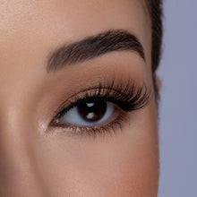 Side view of Frisky false eyelash on a model's eye. 