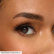 Marigold on model's one eye.