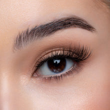 A front view of a woman's eye wearing Kitty Cat false eyelashes.