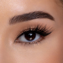 Front view of Midnight Demi false eyelashes on a model's eye. 