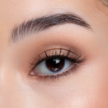 A front view of a woman's eye wearing Mika false eyelashes.