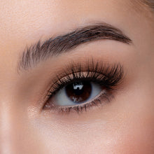 A front view of a woman's eye wearing Tigress false eyelashes.