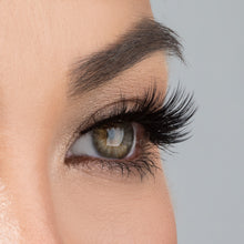 A image of a womans eye wearing Allura Lite false eyelashes from the side.