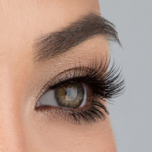 A side eye view of a woman's eye wearing Darling Lower false eyelashes.