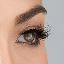 A side view of a woman's eye wearing Temptress Wispy false eyelashes.