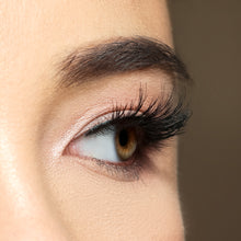 A side eye view of a woman's eye wearing Ethereal Lite false eyelashes.