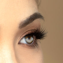 A side view of a woman's eye wearing Siren Double false eyelashes.