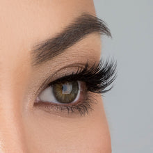 A side view of a woman's eye wearing Iconic false eyelashes.